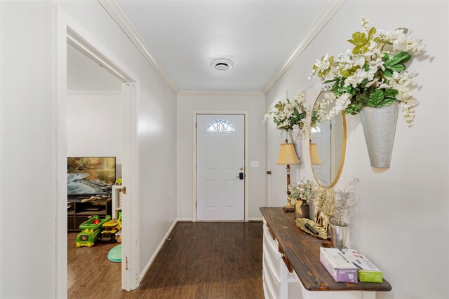 foyer featuring crown molding and dark wood-type flooring