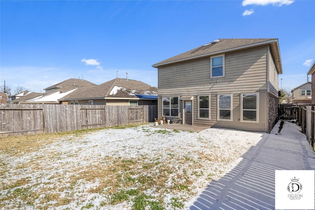 rear view of house featuring a patio