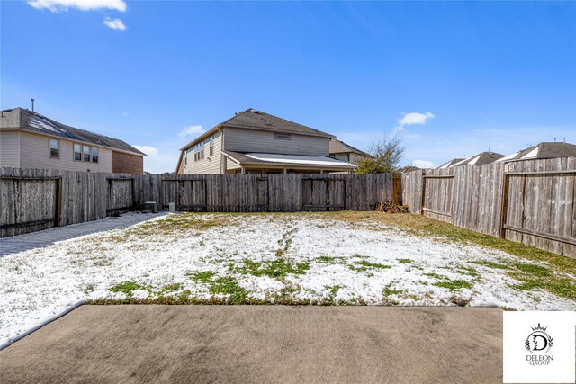 view of yard covered in snow