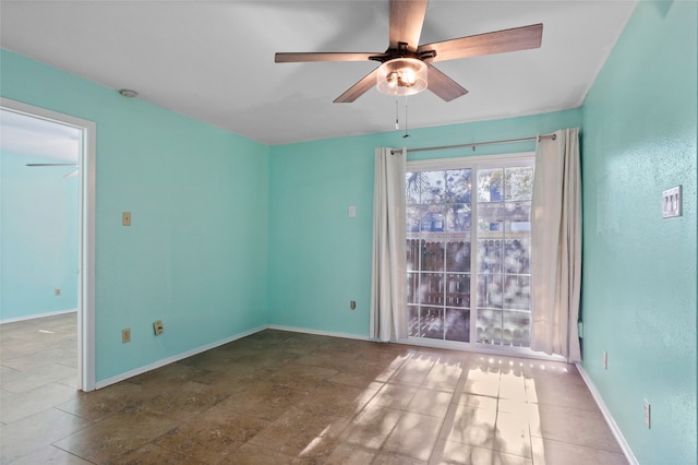 unfurnished room with ceiling fan