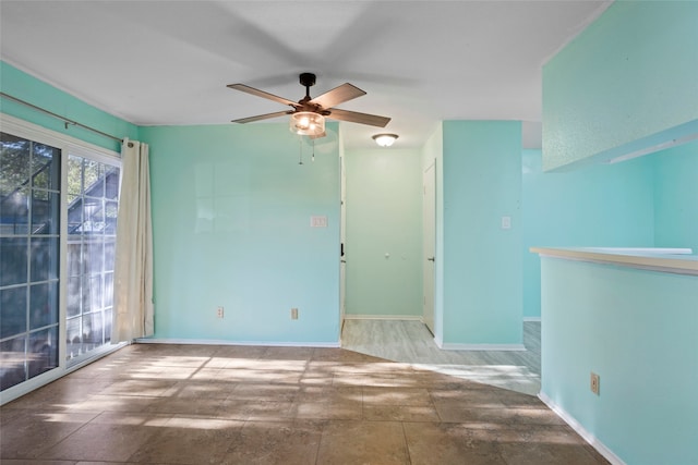 spare room featuring ceiling fan