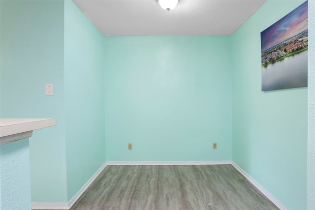 spare room featuring light hardwood / wood-style floors