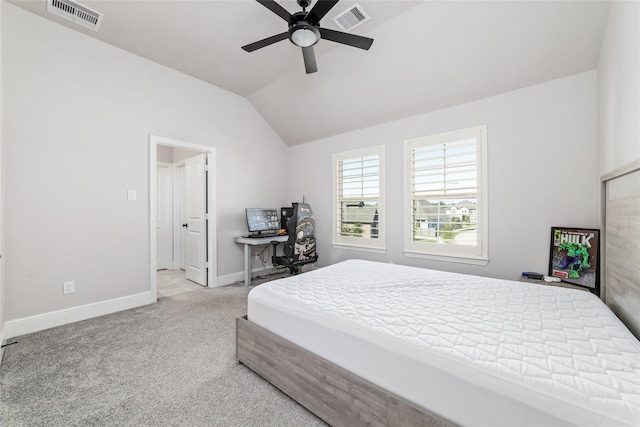 carpeted bedroom with lofted ceiling and ceiling fan