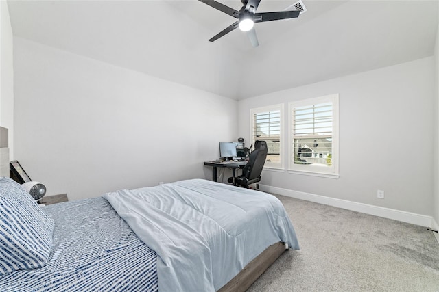 carpeted bedroom featuring lofted ceiling and ceiling fan