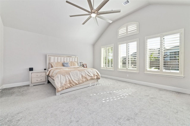 carpeted bedroom with lofted ceiling and ceiling fan