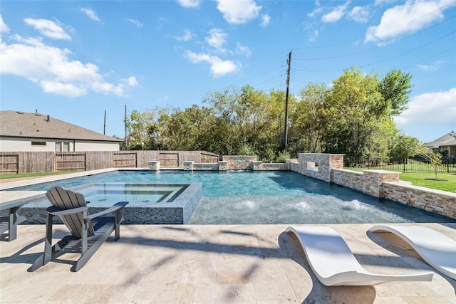 view of pool with an in ground hot tub, pool water feature, and a patio