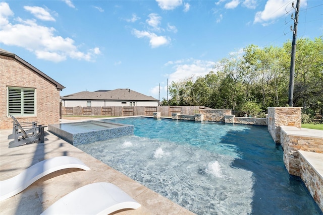 view of swimming pool featuring an in ground hot tub and pool water feature