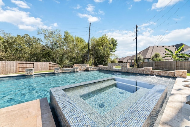 view of swimming pool with an in ground hot tub and pool water feature