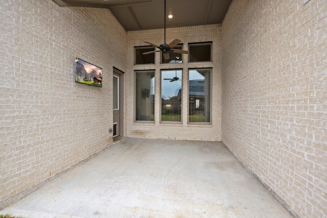 view of patio featuring ceiling fan