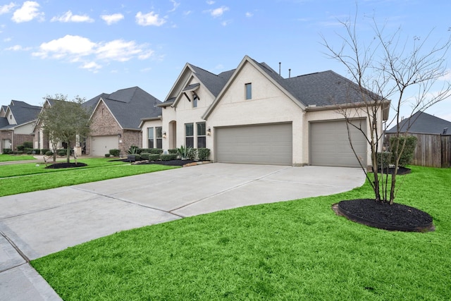 french country inspired facade featuring a garage and a front yard