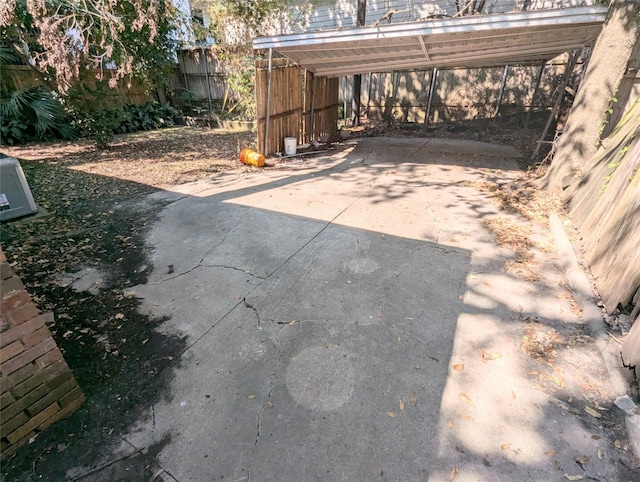 view of patio featuring a carport