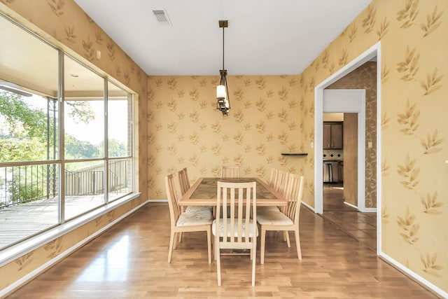 dining room featuring wood-type flooring