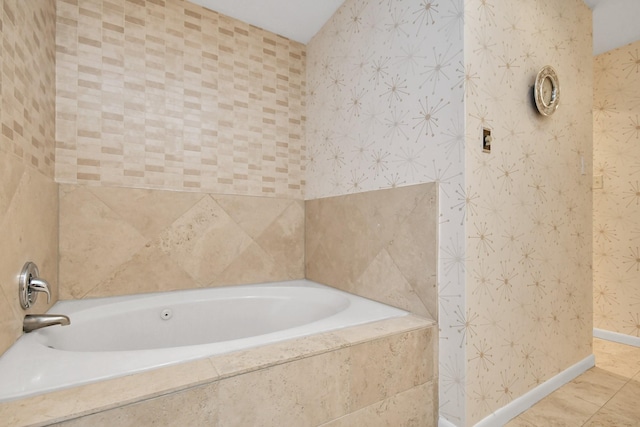 bathroom with tiled bath