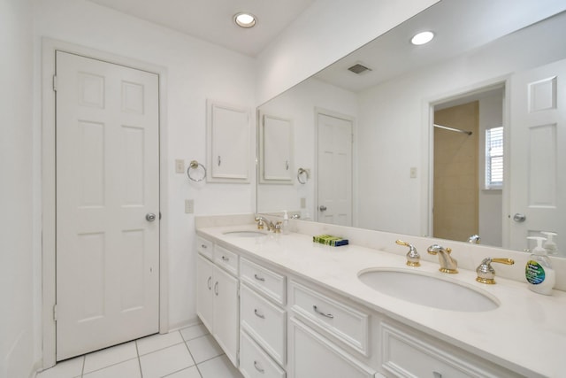 bathroom featuring vanity and tile patterned flooring