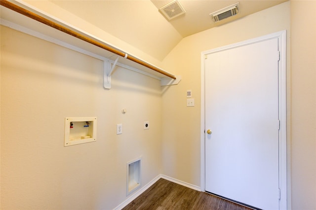 laundry room featuring gas dryer hookup, washer hookup, dark hardwood / wood-style floors, and electric dryer hookup