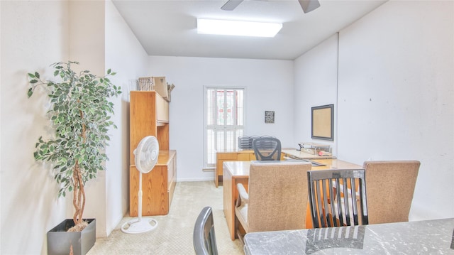 office with light colored carpet and ceiling fan