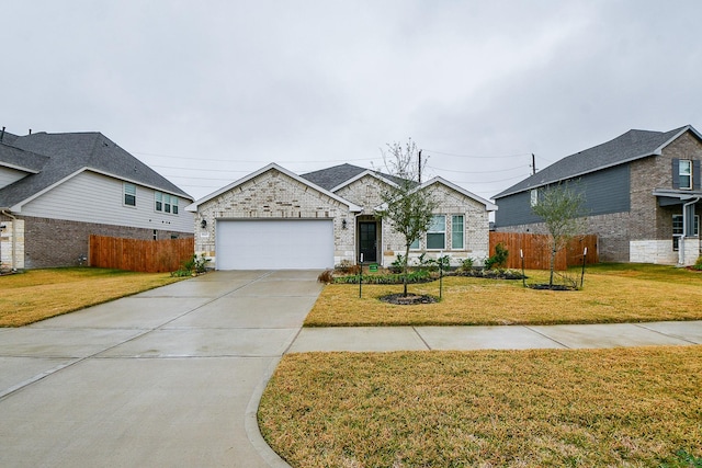 view of front facade with a garage and a front yard