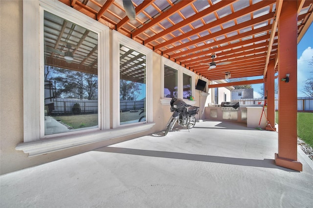 view of patio / terrace featuring an outdoor kitchen, a grill, and ceiling fan