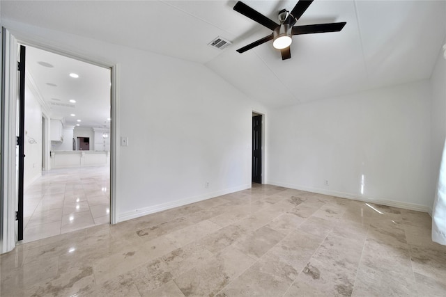 unfurnished room with lofted ceiling and ceiling fan