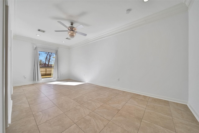 tiled spare room featuring crown molding and ceiling fan