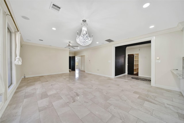 unfurnished living room featuring ceiling fan with notable chandelier and ornamental molding