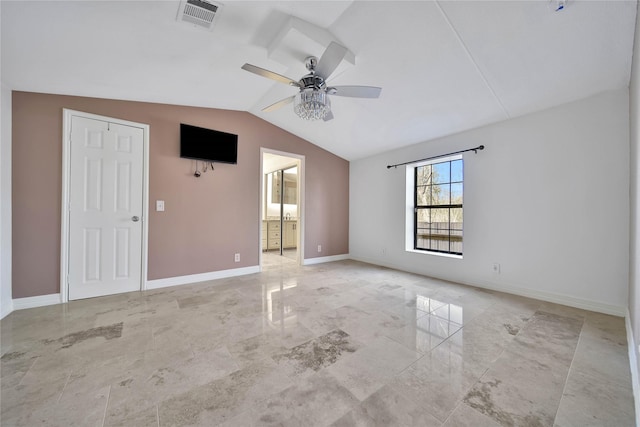 unfurnished room featuring ceiling fan and vaulted ceiling