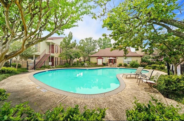 view of pool with a patio