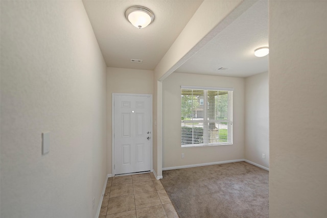 view of tiled foyer