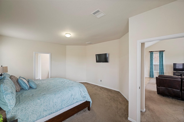 bedroom featuring carpet