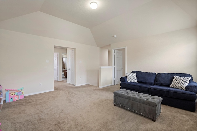 living room with lofted ceiling and light carpet