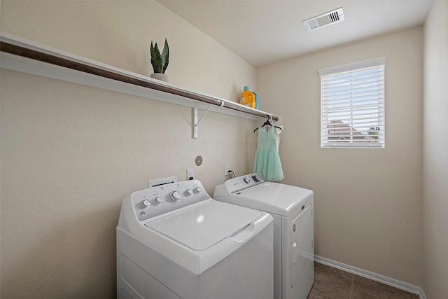 laundry room featuring washer and clothes dryer