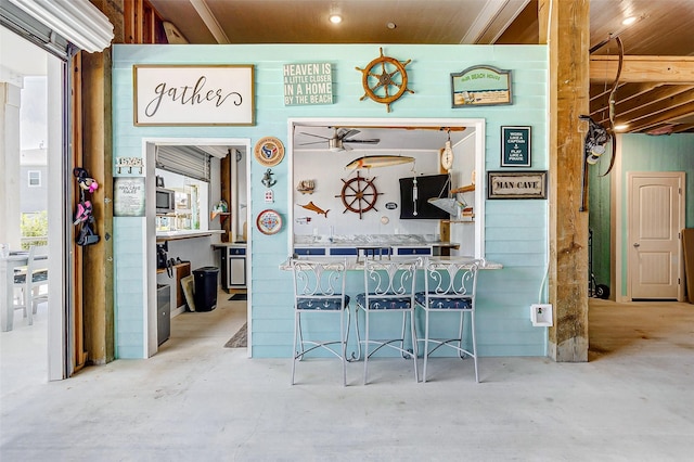 bar with concrete flooring