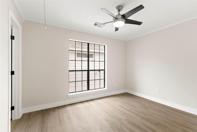 unfurnished room featuring crown molding, ceiling fan, and wood-type flooring