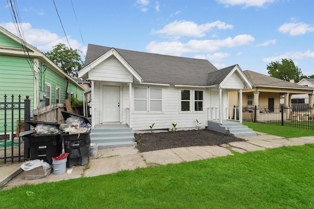 view of front facade with a front yard