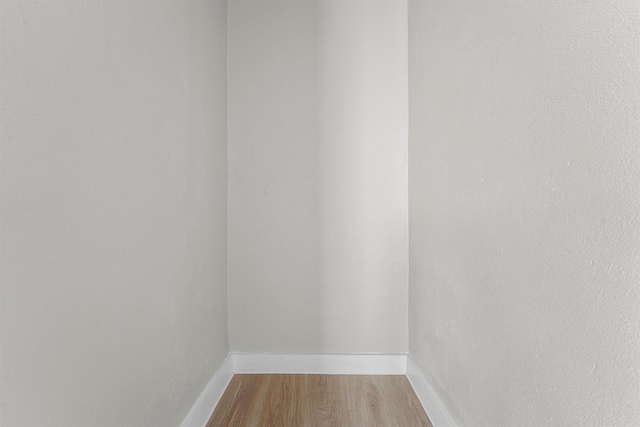 empty room featuring hardwood / wood-style floors