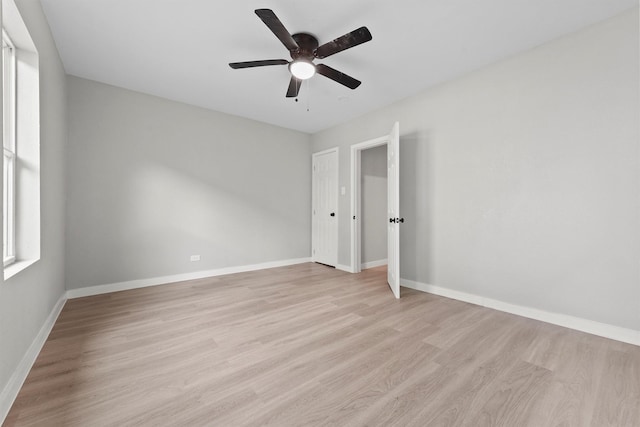 unfurnished bedroom featuring ceiling fan and light wood-type flooring