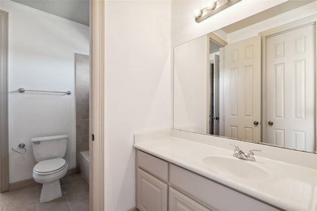 full bathroom featuring vanity, toilet, tile patterned flooring, and shower / bathing tub combination