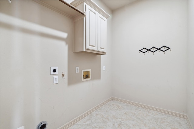 washroom with gas dryer hookup, cabinets, washer hookup, and electric dryer hookup