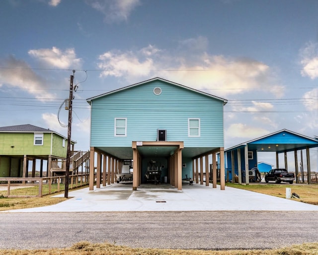 view of front of property with a carport