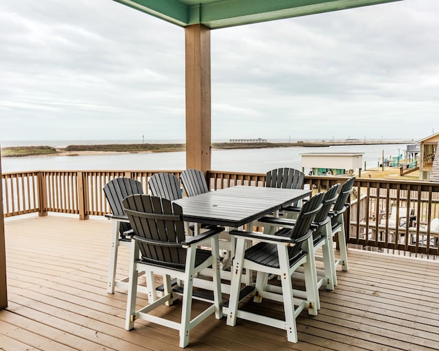 deck featuring a water view