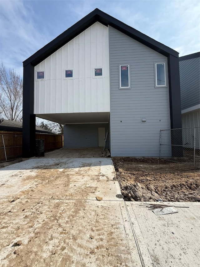 exterior space with a carport