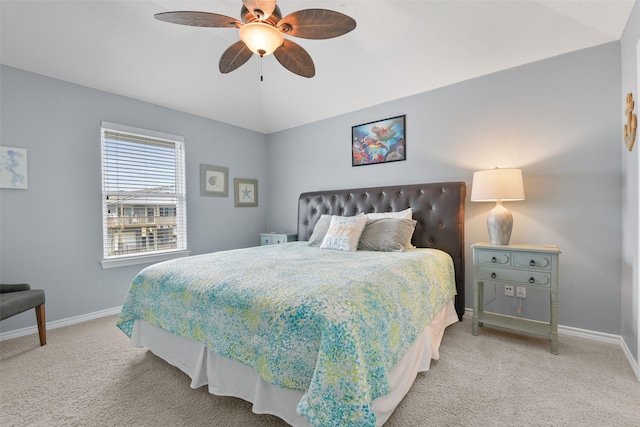 bedroom featuring vaulted ceiling, carpet flooring, and ceiling fan