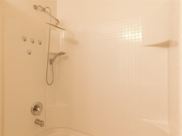 bathroom with shower / bath combination