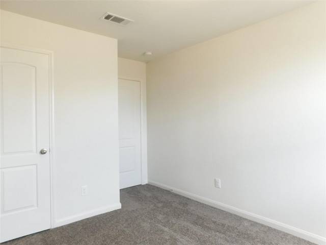 unfurnished bedroom with carpet flooring