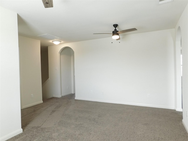 spare room with light carpet and ceiling fan