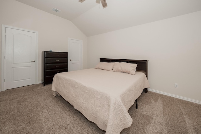 bedroom featuring lofted ceiling, carpet floors, and ceiling fan