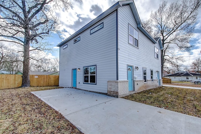 rear view of house with a patio