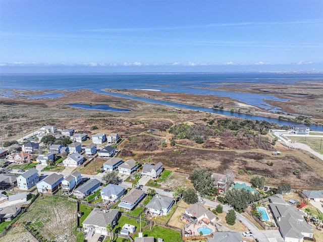 aerial view featuring a residential view and a water view