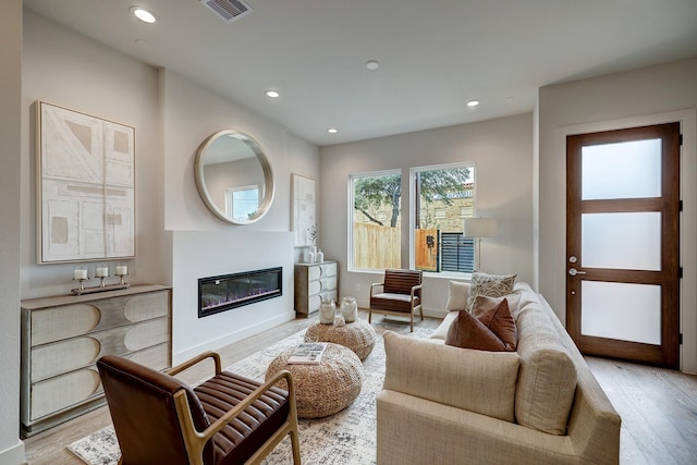 living room with light wood-type flooring