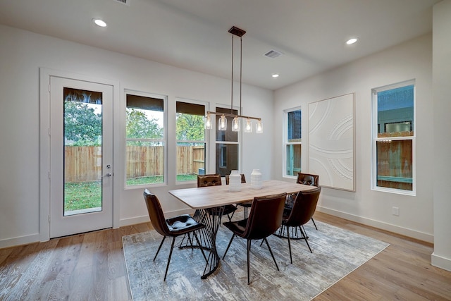 dining area with light wood-type flooring